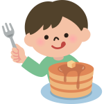 Boy eating pancakes
