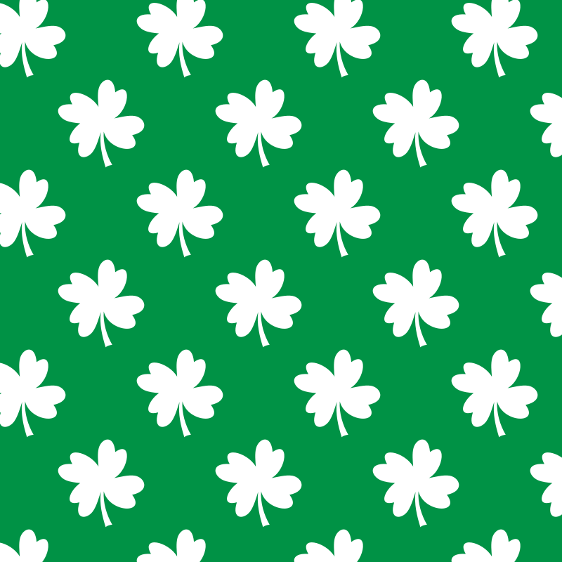 White clover pattern on green background