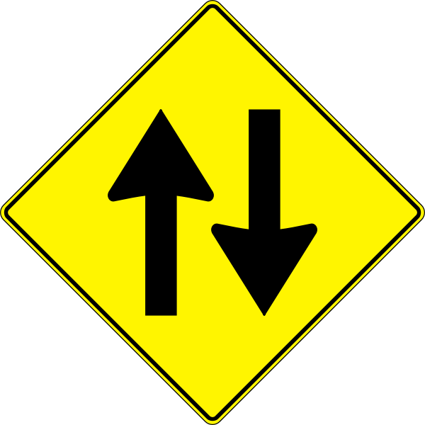 yellow road sign - two way traffic