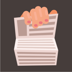Hand holding newspaper