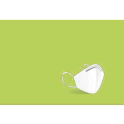 Medical mask on a green background